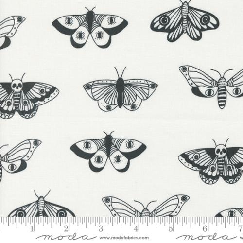 Cotton quilting fabric pattern called 'Mystic Moth in Ghost'. Part of the 'Noir' fabric collection. Designed by Alli K Design for fabric company Moda. SKU: 11543 21. 44-45 inch width.