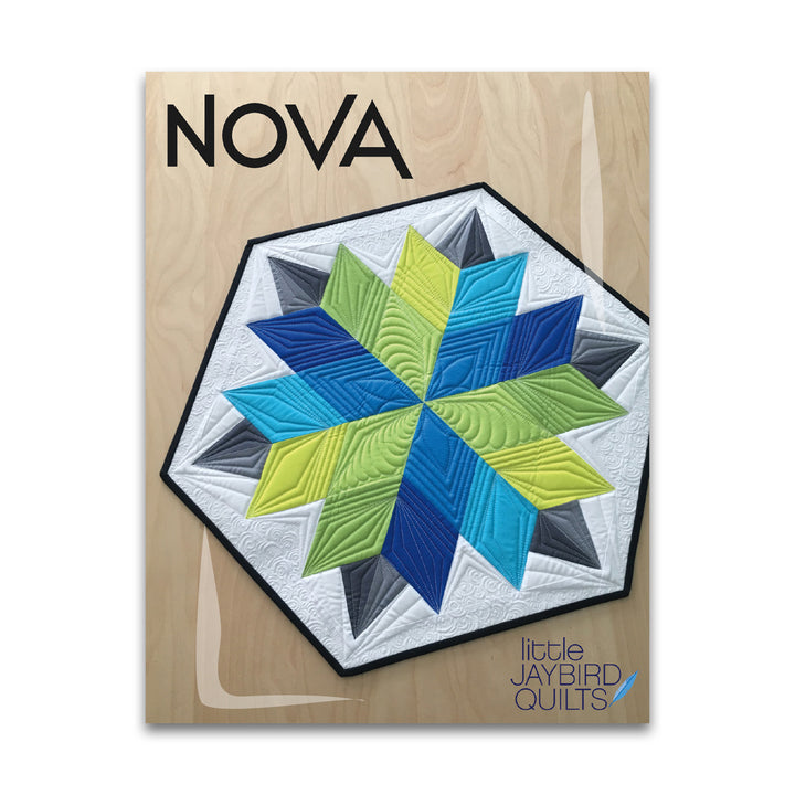 Paper quilt pattern called 'Nova Table Topper' by Jaybird Quilts. SKU: JBQ 175