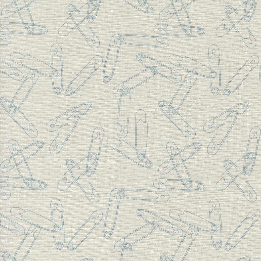 Cotton quilting fabric pattern called 'Safety Pins in Fog'. Part of the 'Still More Paper' fabric collection. Designed by Zen Chic for fabric company MODA. SKU: 1873 14. 44-45 inch width.