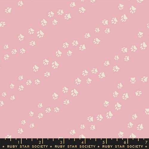 Cotton quilting fabric pattern called 'Wander Paw in Lavender'. Part of the 'Dog Park' fabric collection. Designed by Sarah Watts for fabric company Ruby Star Society. SKU: RS2099 12. 44-45 inch width.