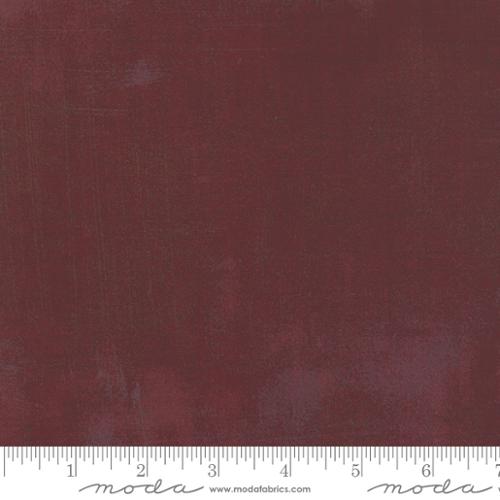 Cotton quilting fabric pattern called 'Burgundy'. Part of the 'Grunge Basics' fabric collection. Designed by BasicGrey for fabric company MODA. SKU: 30150 297. 44-45 inch width.