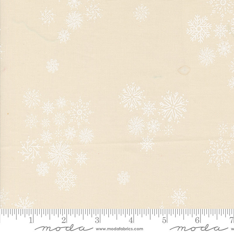 Cotton quilting fabric pattern called 'Snowflake Fall in Natural White'. Part of the 'Cozy Wonderland' fabric collection. Designed by Fancy That Design House for fabric company Moda. SKU: 45596 31. 44-45 inch width.