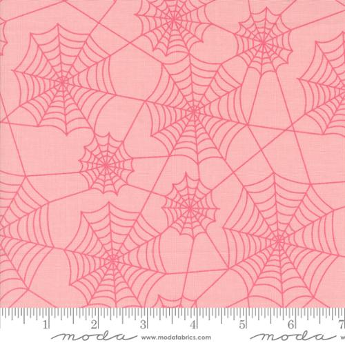 Cotton quilting fabric pattern called 'Webs in Bubble Gum Pink'. Part of the 'Hey Boo' fabric collection. Designed by Lella Boutique for fabric company Moda. SKU: 5213 13. 44-45 inch width.