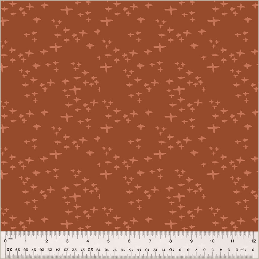 Cotton quilting fabric pattern called 'Glimmer in Brick'. Part of the 'Moonlit' fabric collection. Designed by Jennifer Moore / Monaluna for fabric company Windham Fabrics. SKU: 54289-4. 44-45 inch width.