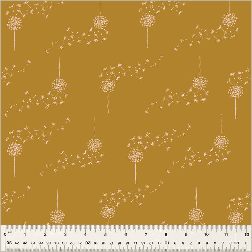 Cotton quilting fabric pattern called 'Wish in Mustard'. Part of the 'Moonlit' fabric collection. Designed by Jennifer Moore / Monaluna for fabric company Windham Fabrics. SKU: 54290-11. 44-45 inch width.