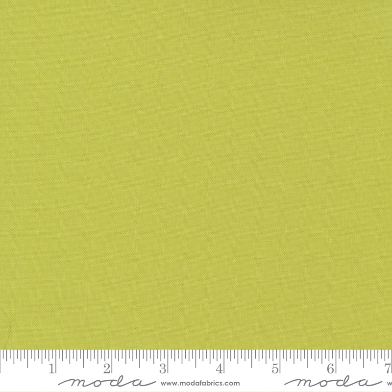 Cotton quilting fabric pattern called 'Chartreuse'. Part of the 'Bella Solids' fabric collection. Designed by Moda Fabrics for fabric company Moda Fabrics. SKU: 9900 188. 44-45 inch width.