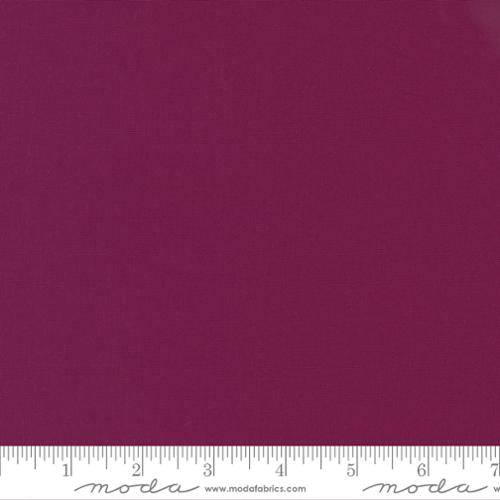 Cotton quilting fabric pattern called 'Boysenberry'. Part of the 'Bella Solids' fabric collection. Designed by Moda Fabrics for fabric company Moda Fabrics. SKU: 9900 217. 44-45 inch width.