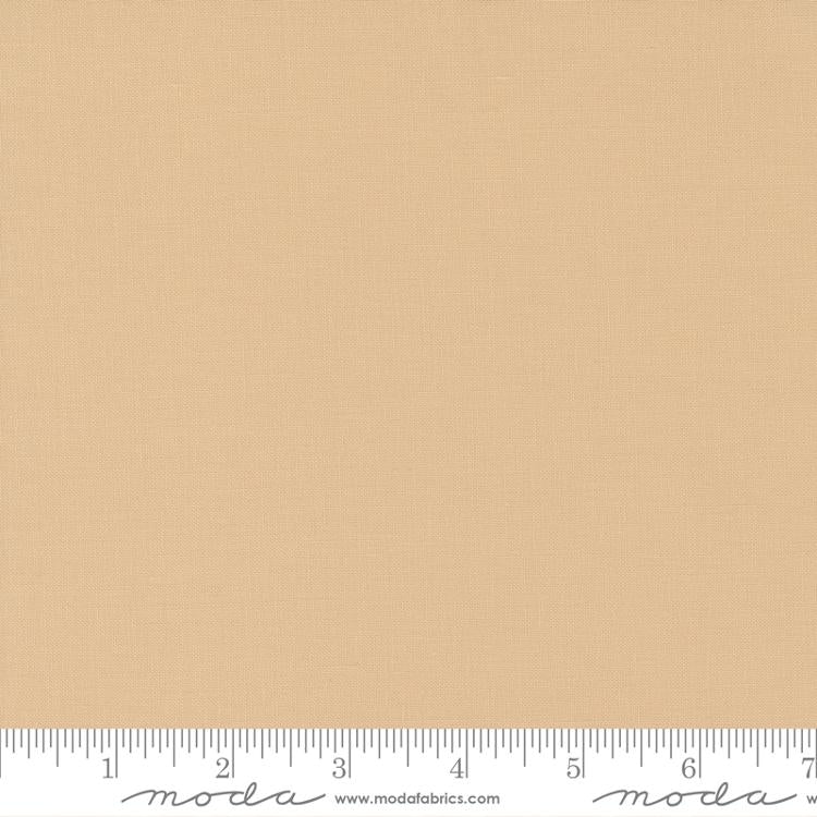 Cotton quilting fabric pattern called 'Almond'. Part of the 'Bella Solids' fabric collection. Designed by Moda Fabrics for fabric company Moda Fabrics. SKU: 9900 243. 44-45 inch width.