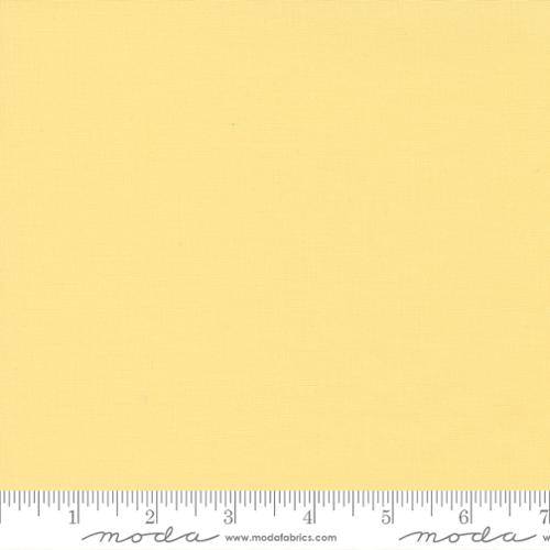 Cotton quilting fabric pattern called 'Canary'. Part of the 'Bella Solids' fabric collection. Designed by Moda Fabrics for fabric company Moda Fabrics. SKU: 9900 272. 44-45 inch width.