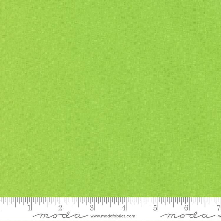 Cotton quilting fabric pattern called 'Wasabi'. Part of the 'Bella Solids' fabric collection. Designed by Moda Fabrics for fabric company Moda Fabrics. SKU: 9900 392. 44-45 inch width.