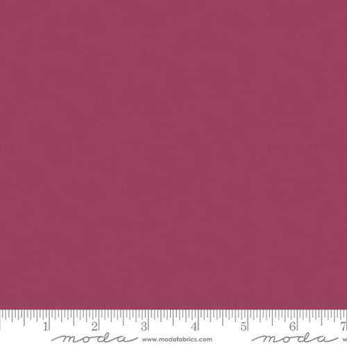 Cotton quilting fabric pattern called 'Rose Wine'. Part of the 'Bella Solids' fabric collection. Designed by Moda for fabric company Moda. SKU: 9900 453. 44-45 inch width.