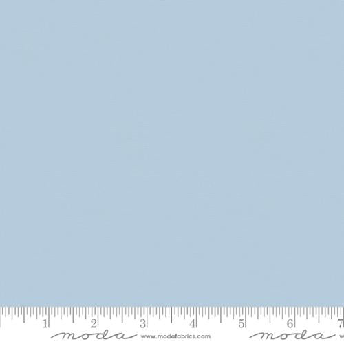 Cotton quilting fabric pattern called 'Powder Blue'. Part of the 'Bella Solids' fabric collection. Designed by Moda for fabric company Moda. SKU: 9900 460. 44-45 inch width.