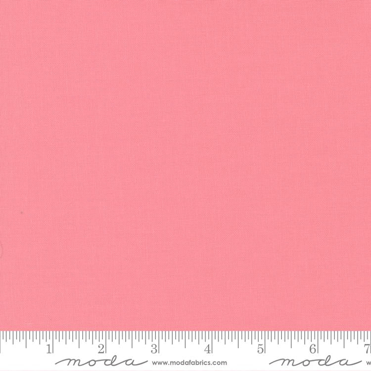 Cotton quilting fabric pattern called 'Pink'. Part of the 'Bella Solids' fabric collection. Designed by Moda Fabrics for fabric company Moda Fabrics. SKU: 9900 61. 44-45 inch width.