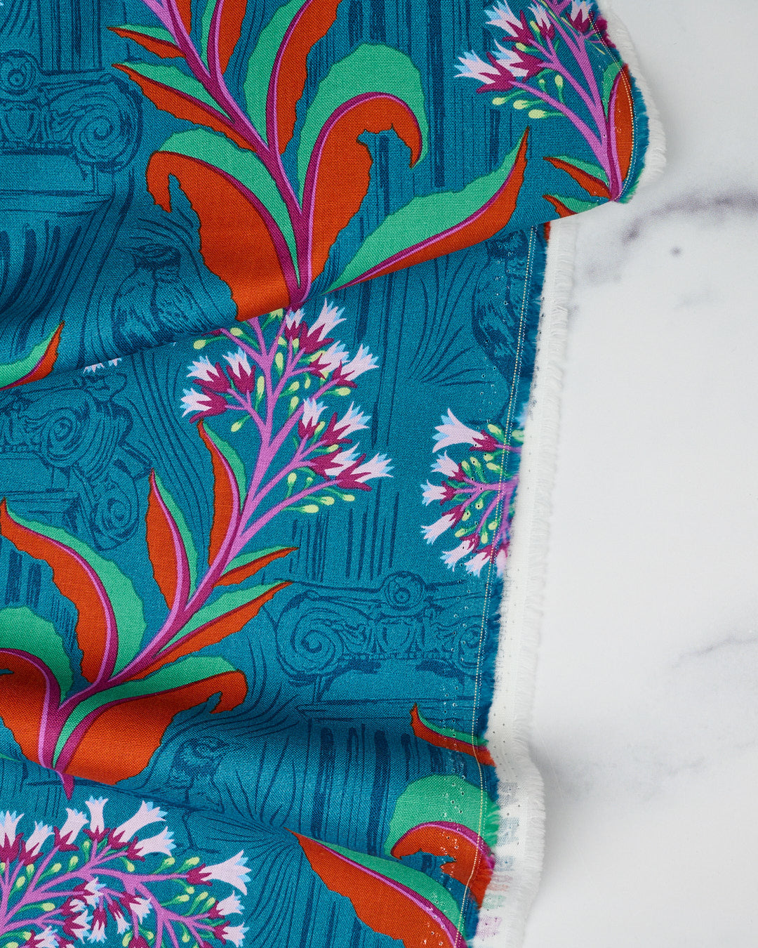 Cotton quilting fabric pattern called 'Aphrodite Small'. Part of the 'Our Fair Home' fabric collection. Designed by Anna Maria Horner for fabric company Free Spirit Fabrics. SKU: PWAH216.SEA. 44-45 inch width.