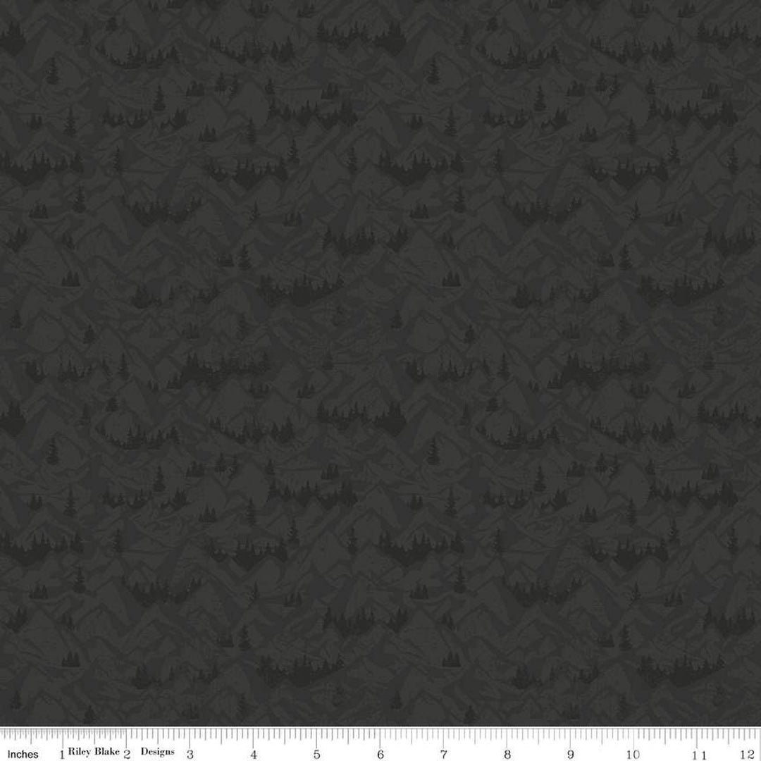 Cotton quilting fabric pattern called 'Mountains in Charcoal'. Part of the 'Legends of the National Parks' fabric collection. Designed by Anderson Design Group for fabric company Riley Blake. SKU: C13284-CHARCOAL. 44-45 inch width.