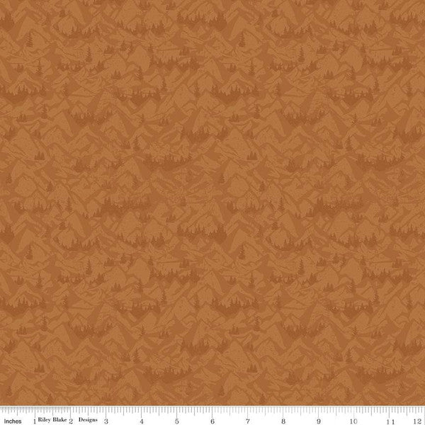 Cotton quilting fabric pattern called 'Mountains in Sienna'. Part of the 'Legends of the National Parks' fabric collection. Designed by Anderson Design Group for fabric company Riley Blake. SKU: C13284-SIENNA. 44-45 inch width.