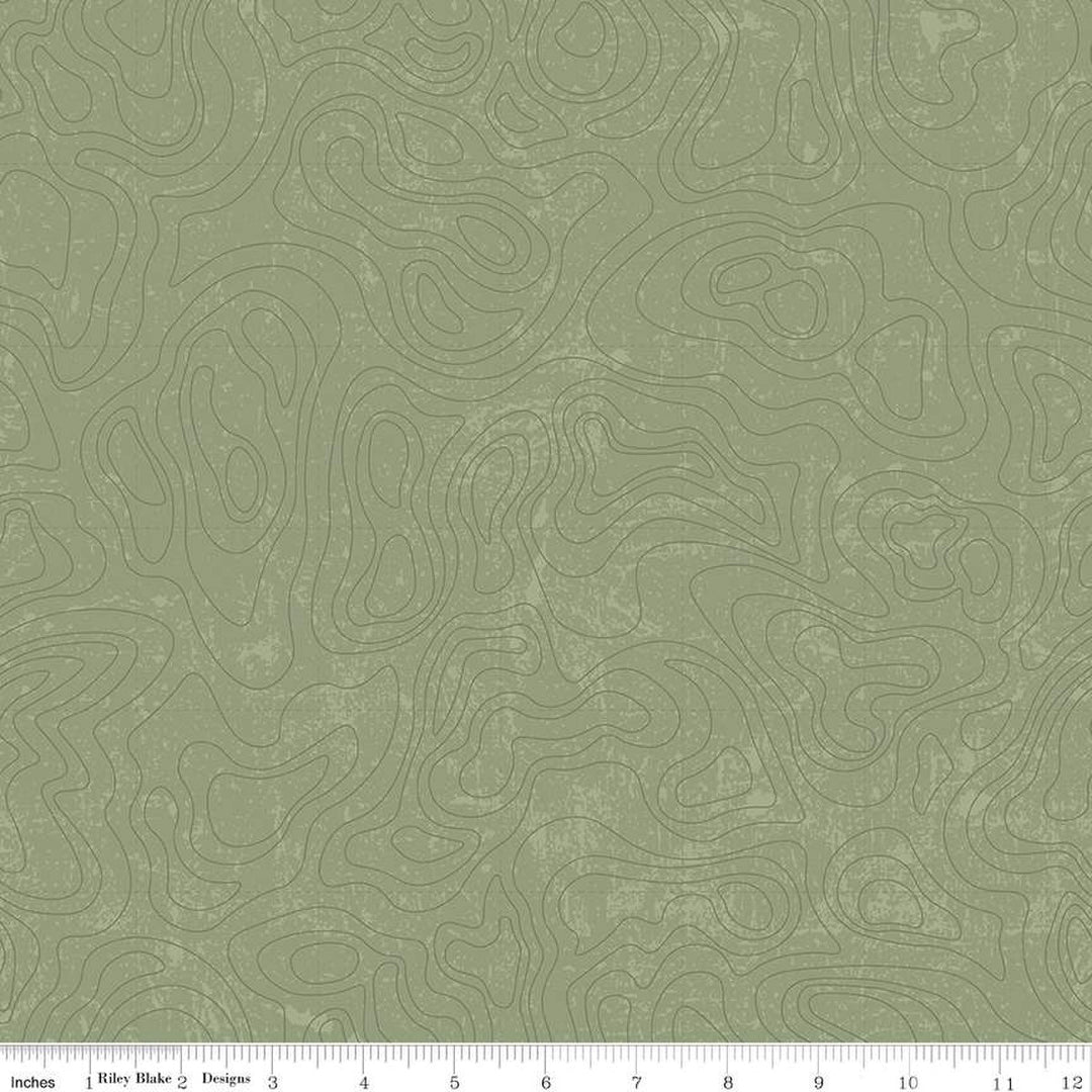 Cotton quilting fabric pattern called 'Topographic in Green'. Part of the 'National Parks' fabric collection. Designed by Anderson Design Group for fabric company Riley Blake. SKU: C13293-GREEN. 44-45 inch width.