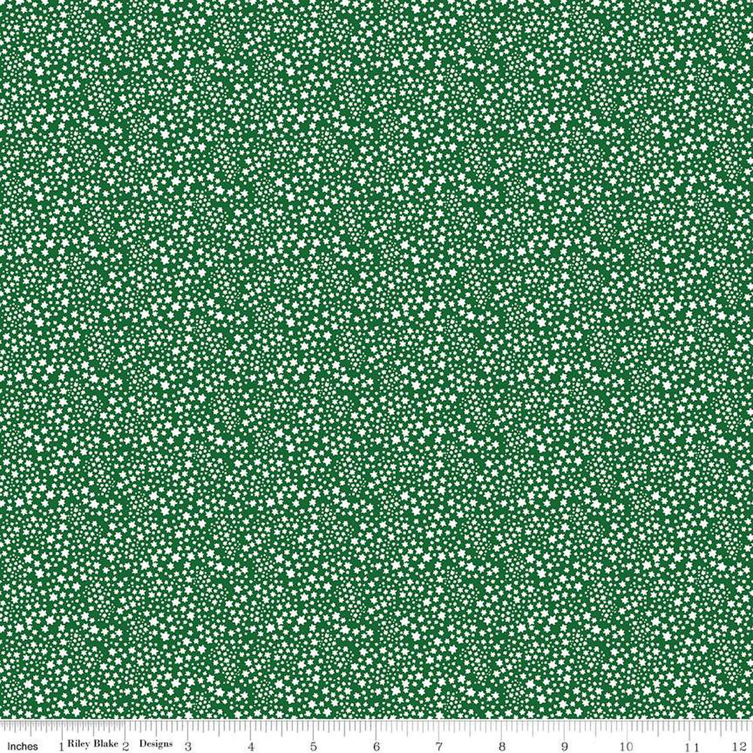 Cotton quilting fabric pattern called 'Starflower in Forest'. Part of the 'Albion' fabric collection. Designed by Julia Frazier for fabric company Riley Blake. SKU: C14685-FOREST. 44-45 inch width.