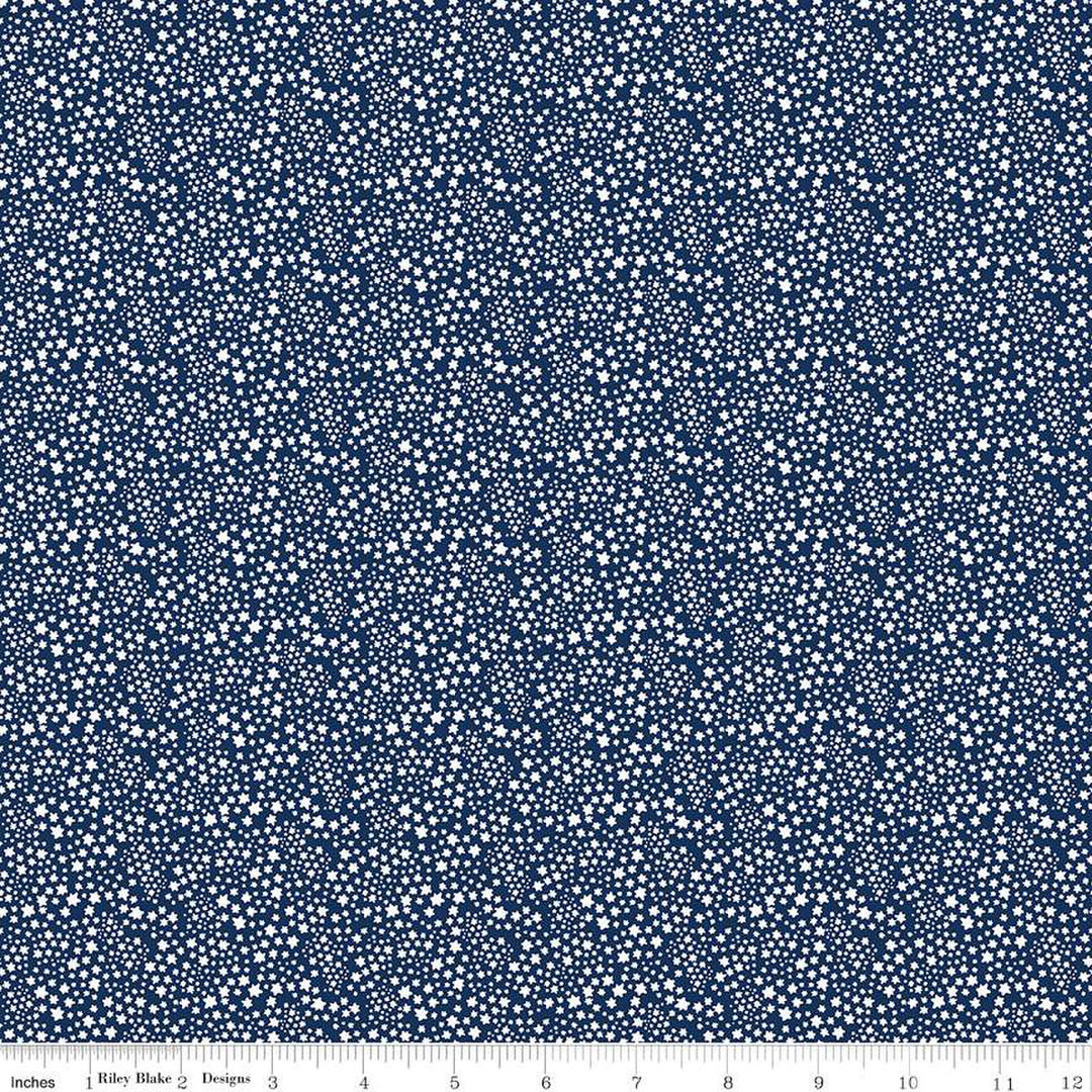 Cotton quilting fabric pattern called 'Starflower in Midnight'. Part of the 'Albion' fabric collection. Designed by Julia Frazier for fabric company Riley Blake. SKU: C14685-MIDNIGHT. 44-45 inch width.