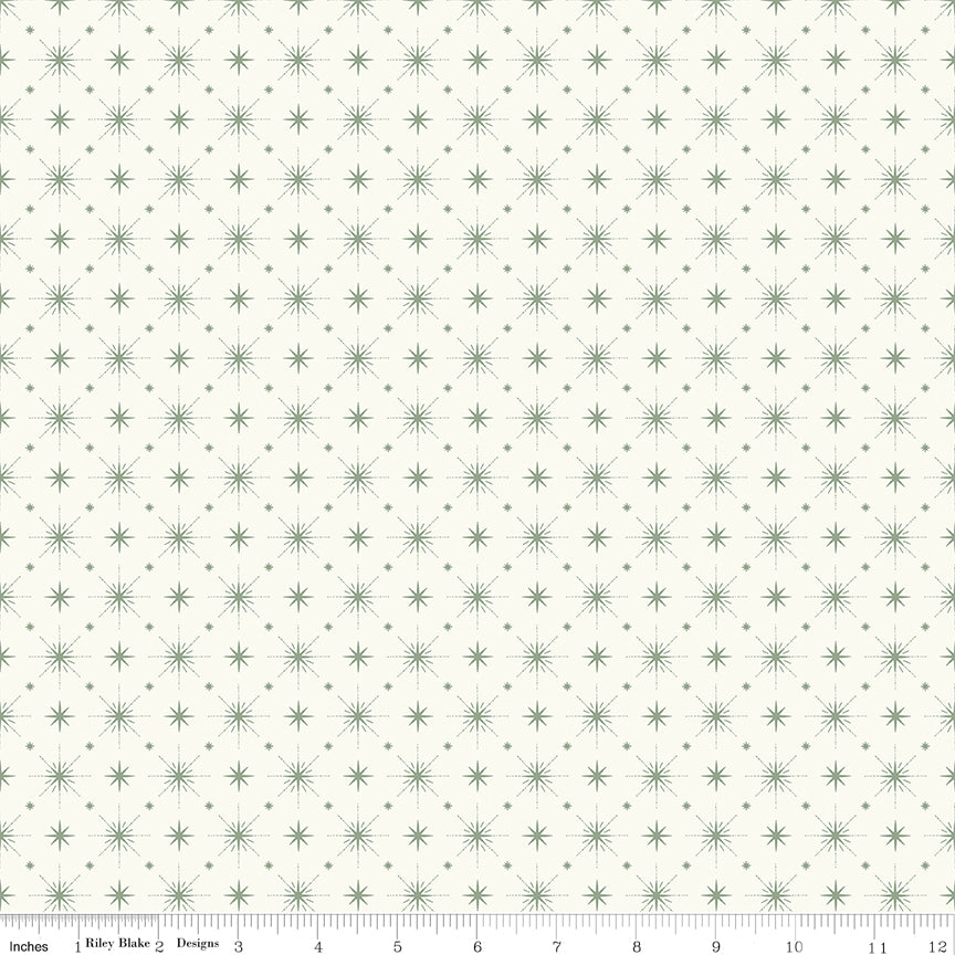 Cotton quilting fabric pattern called 'Stars in Cream'. Part of the 'Christmas is in Town' fabric collection. Designed by Sandy Gervais for fabric company Riley Blake. SKU: C14747-CREAM. 44-45 inch width.