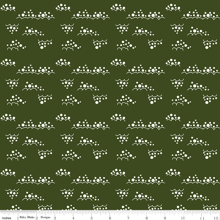 Cotton quilting fabric pattern called 'Snowballs in Dark Green'. Part of the 'Christmas is in Town' fabric collection. Designed by Sandy Gervais for fabric company Riley Blake. SKU: C14749-DKGREEN. 44-45 inch width.