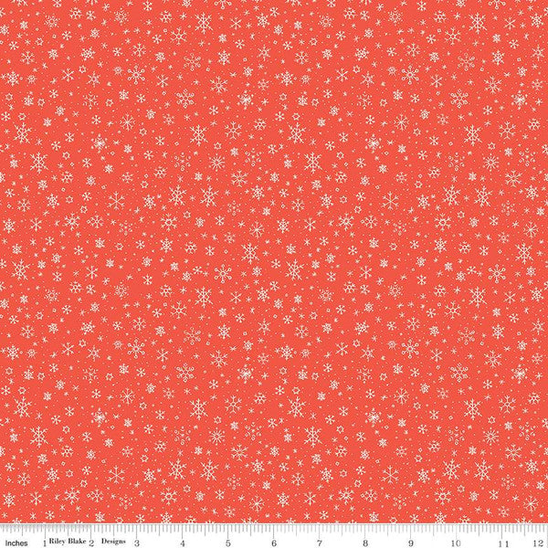 Cotton quilting fabric pattern called 'Snowflakes in Red'. Part of the 'Ski Hill' fabric collection. Designed by Corinne Wells for fabric company Riley Blake. SKU: C14776-RED. 44-45 inch width.