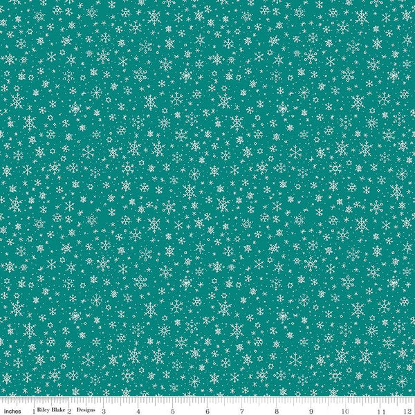 Cotton quilting fabric pattern called 'Snowflakes in Teal'. Part of the 'Ski Hill' fabric collection. Designed by Corinne Wells for fabric company Riley Blake. SKU: C14776-TEAL. 44-45 inch width.