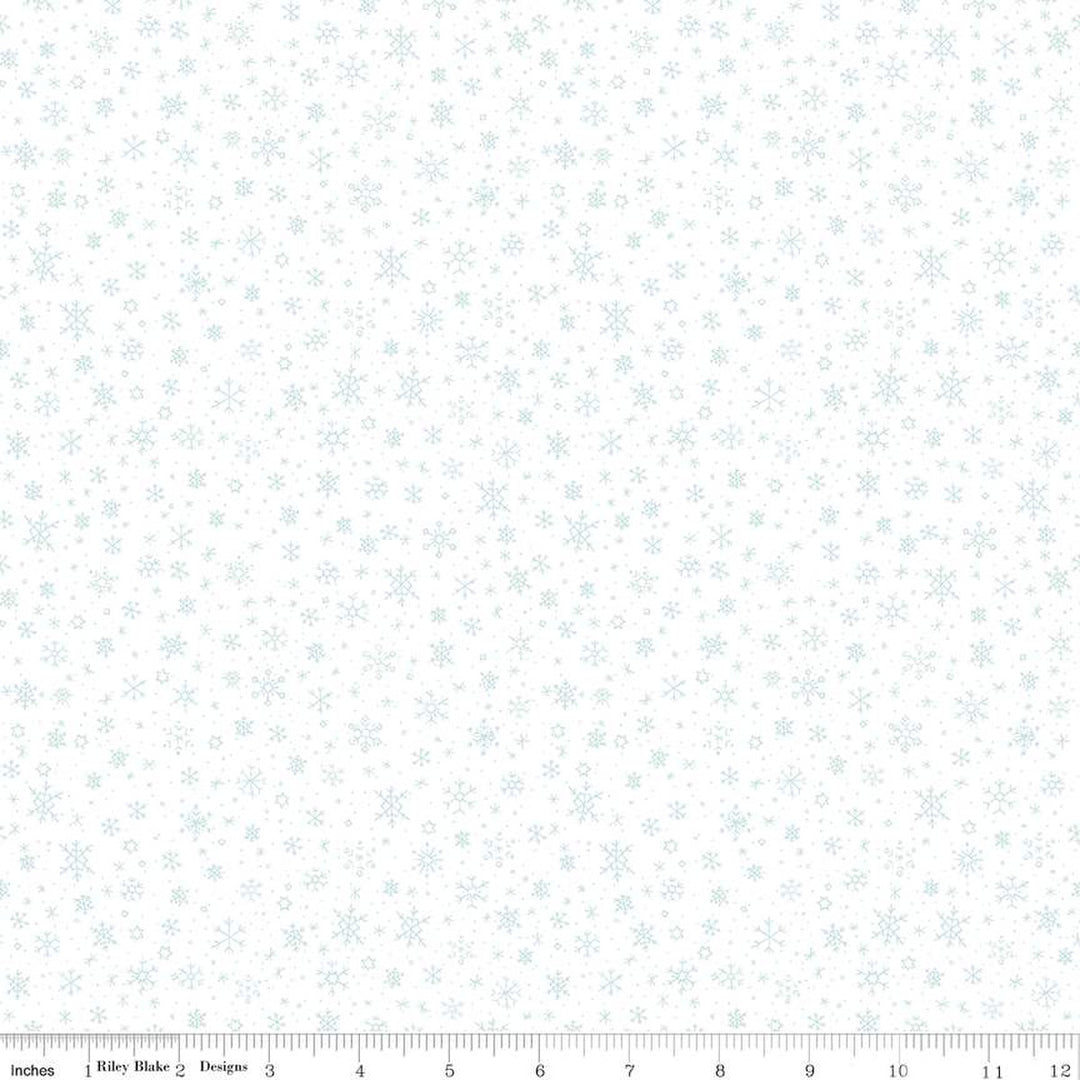 Cotton quilting fabric pattern called 'Snowflakes in White'. Part of the 'Ski Hill' fabric collection. Designed by Corinne Wells for fabric company Riley Blake. SKU: C14776-WHITE. 44-45 inch width.