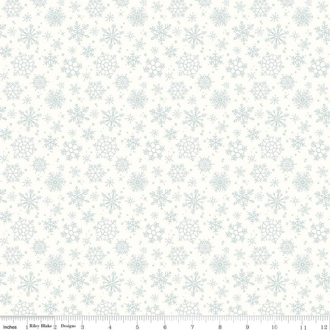 Cotton quilting fabric pattern called 'Snowflake in Snow'. Part of the 'Magical Winterland' fabric collection. Designed by Lisa Audit for fabric company Riley Blake. SKU: C14944-SNOW. 44-45 inch width.