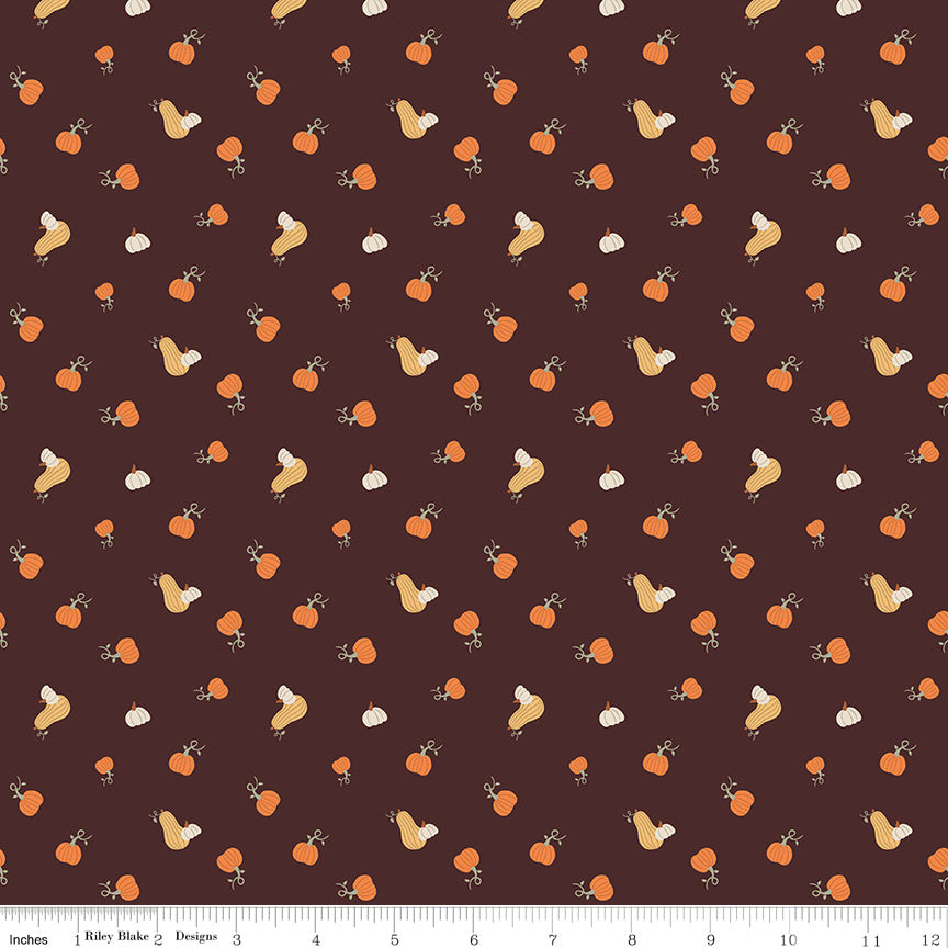 Cotton quilting fabric pattern called 'Pumpkins in Espresso'. Part of the 'Pumpkin Spice' fabric collection. Designed by Simple Simon & Company for fabric company Riley Blake. SKU: C14993-ESPRESSO. 44-45 inch width.