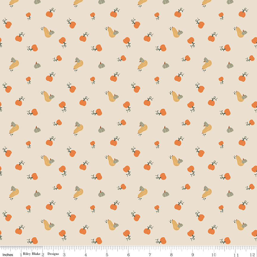 Cotton quilting fabric pattern called 'Pumpkins in Ivory'. Part of the 'Pumpkin Spice' fabric collection. Designed by Simple Simon & Company for fabric company Riley Blake. SKU: C14993-IVORY. 44-45 inch width.