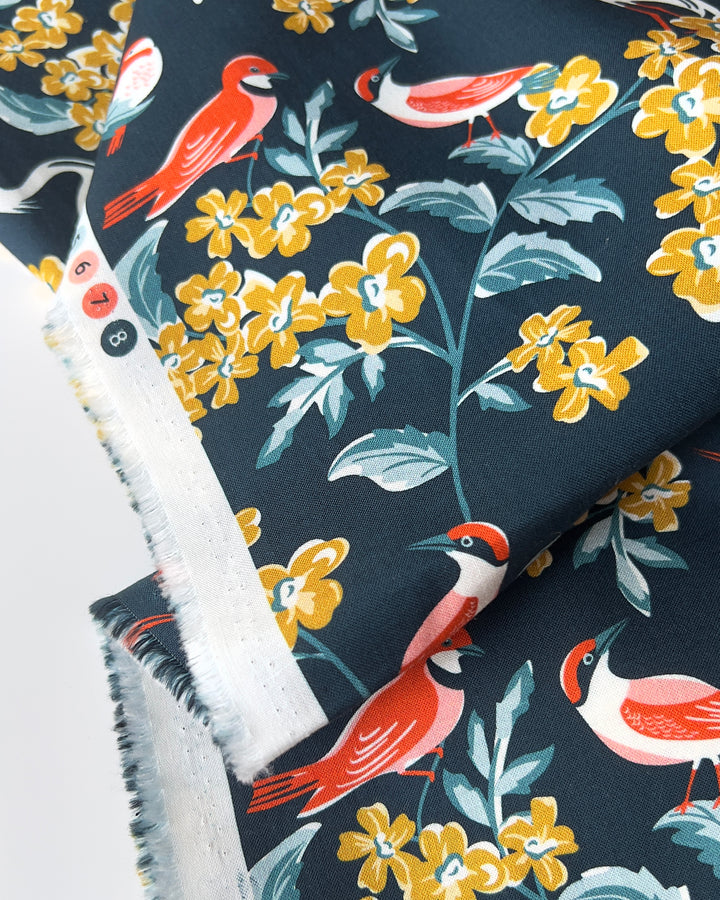 Cotton quilting fabric pattern called 'Bird Watching'. Part of the 'Flower Garden' fabric collection. Designed by Hang Tight Studio for fabric company Cloud 9 Fabrics. SKU: 227325. 44-45 inch width.