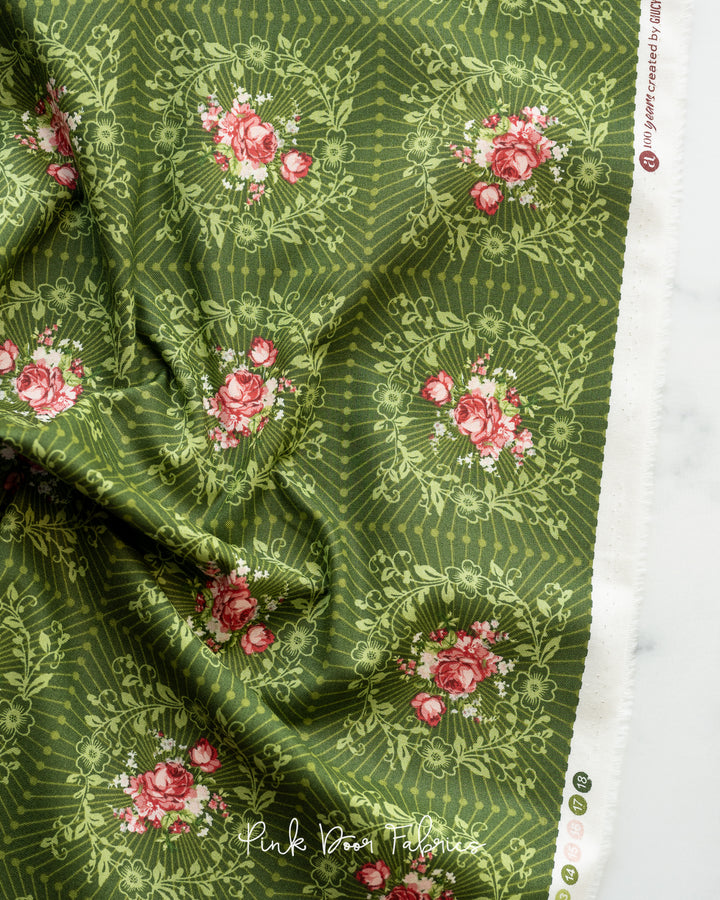 Cotton quilting fabric pattern called 'Wreath in Verde'. Part of the 'Natale' fabric collection. Designed by Giucy Giuce for fabric company Andover Fabrics. SKU: A-9873-G. 44-45 inch width.