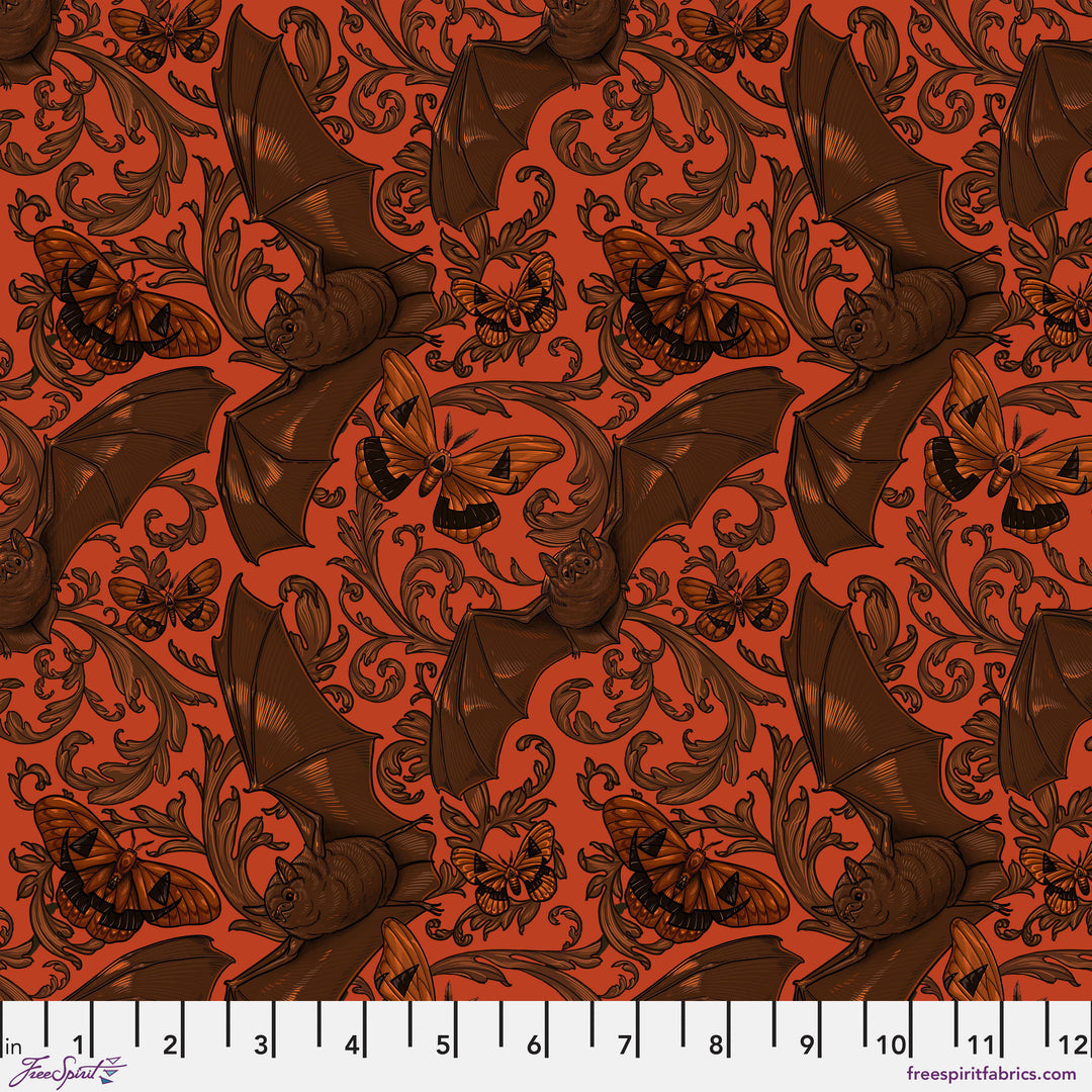 Cotton quilting fabric pattern called 'Bat & Moth in Orange'. Part of the 'Mystic Moonlight' fabric collection. Designed by Rachel Hauer for fabric company Free Spirit. SKU: PWRH086.ORANGE. 44-45 inch width.