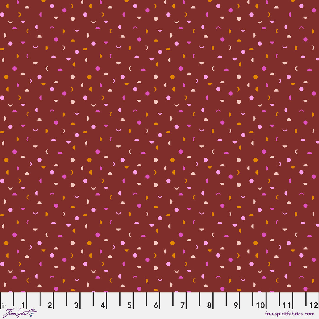 Cotton quilting fabric pattern called 'It's a Phase in Nutmeg'. Part of the 'Mythical' fabric collection. Designed by Stacy Peterson for fabric company FreeSpirit Fabrics. SKU: PWST014.XNUTMEG. 44-45 inch width.