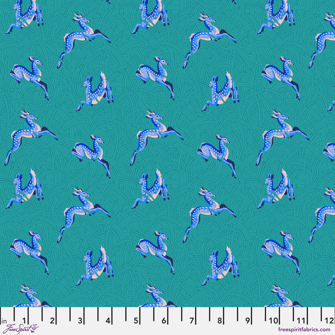 Cotton quilting fabric pattern called 'Small Wild Meadow in Teal'. Part of the 'Mythical' fabric collection. Designed by Stacy Peterson for fabric company FreeSpirit Fabrics. SKU: PWST016.XTEAL. 44-45 inch width.