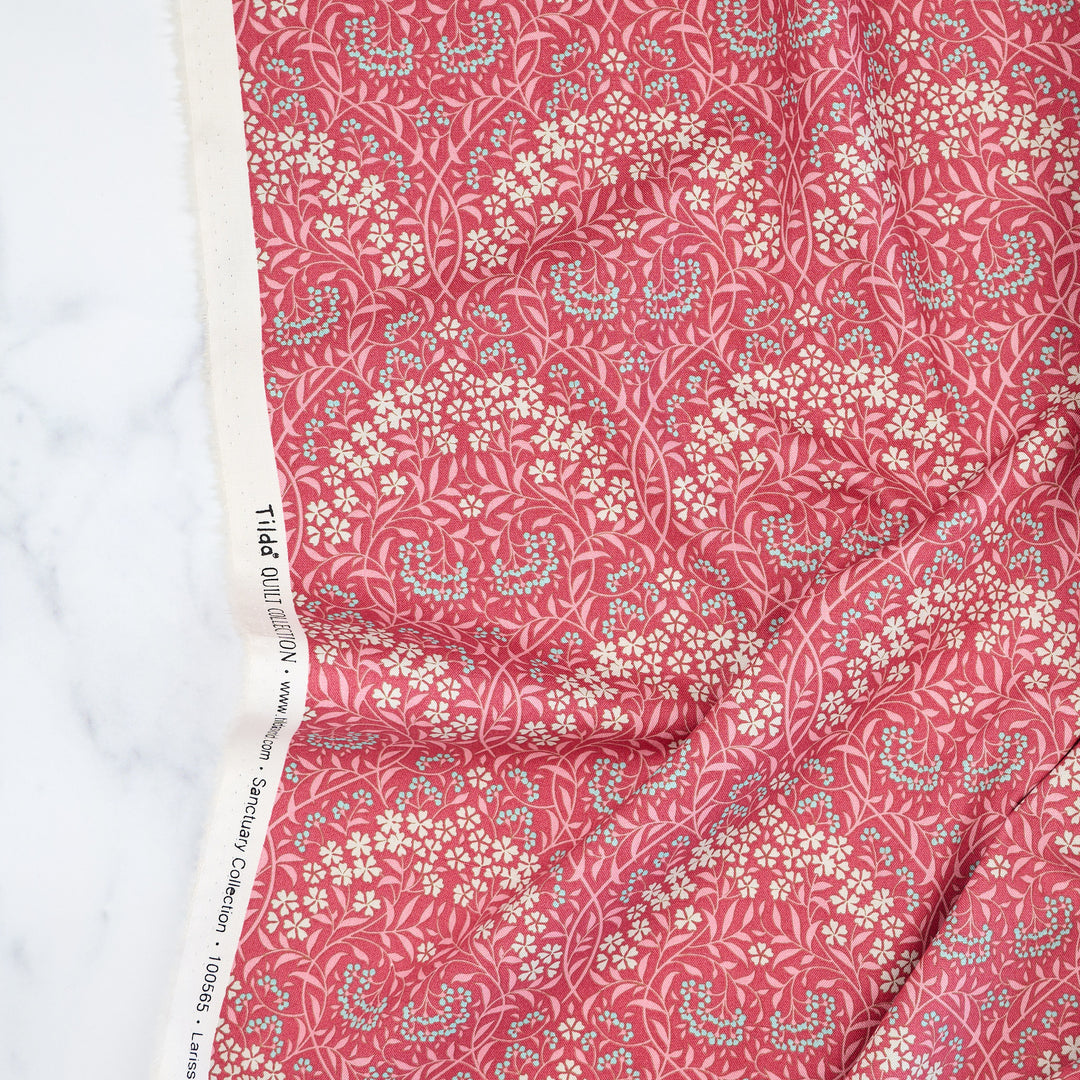 Cotton quilting fabric pattern called 'Larissa Rhubarb'. Part of the 'Sanctuary' fabric collection. Designed by Tone Finnanger for fabric company Tilda Fabrics. SKU: TIL100565. 44-45 inch width.