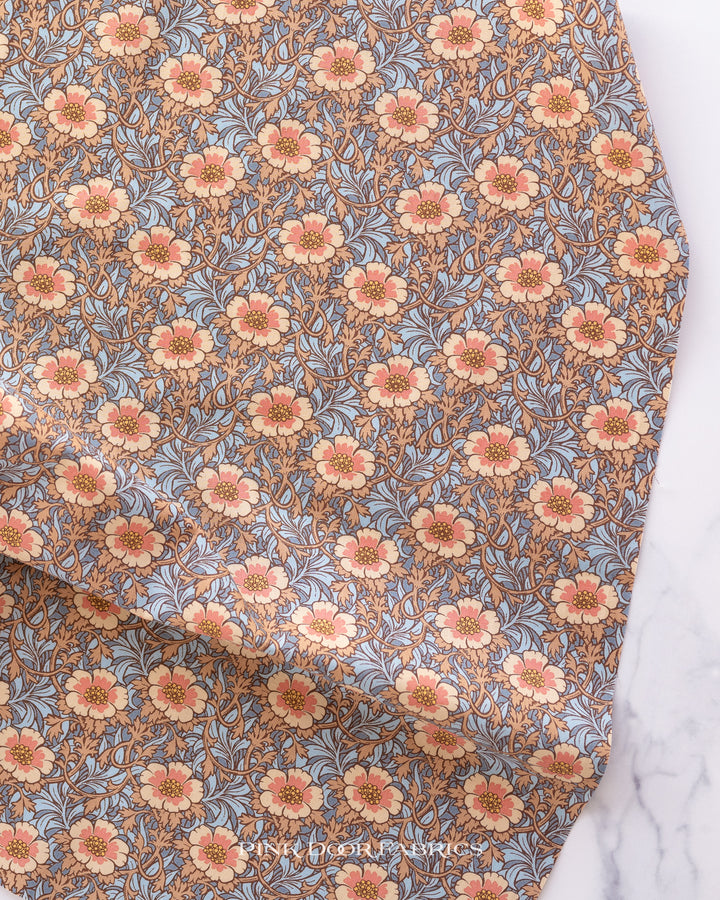 Cotton quilting fabric pattern called 'Winter Rose in Hazel'. Part of the 'Hibernation' fabric collection. Designed by Tilda Fabrics for fabric company Tilda Fabrics. SKU: 100532. 44-45 inch width.