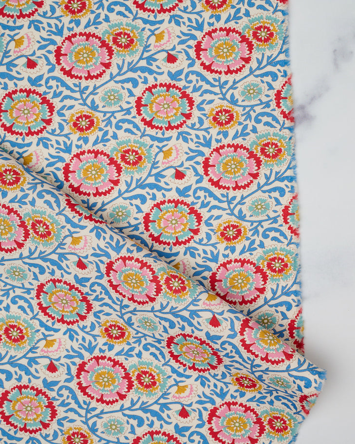 Cotton quilting fabric pattern called 'Elodie in Blue'. Part of the 'Jubilee' fabric collection. Designed by Tilda Fabrics for fabric company Tilda Fabrics. SKU: 100560. 44-45 inch width.