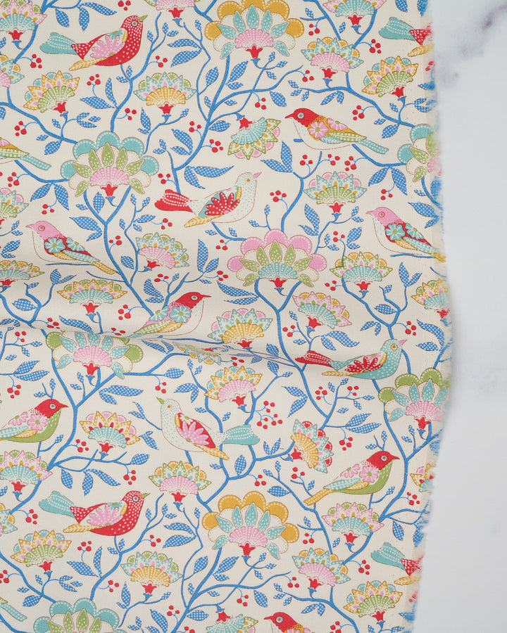 Cotton quilting fabric pattern called 'Bird Tree in Cream'. Part of the 'Jubilee' fabric collection. Designed by Tilda Fabrics for fabric company Tilda Fabrics. SKU: 100557. 44-45 inch width.