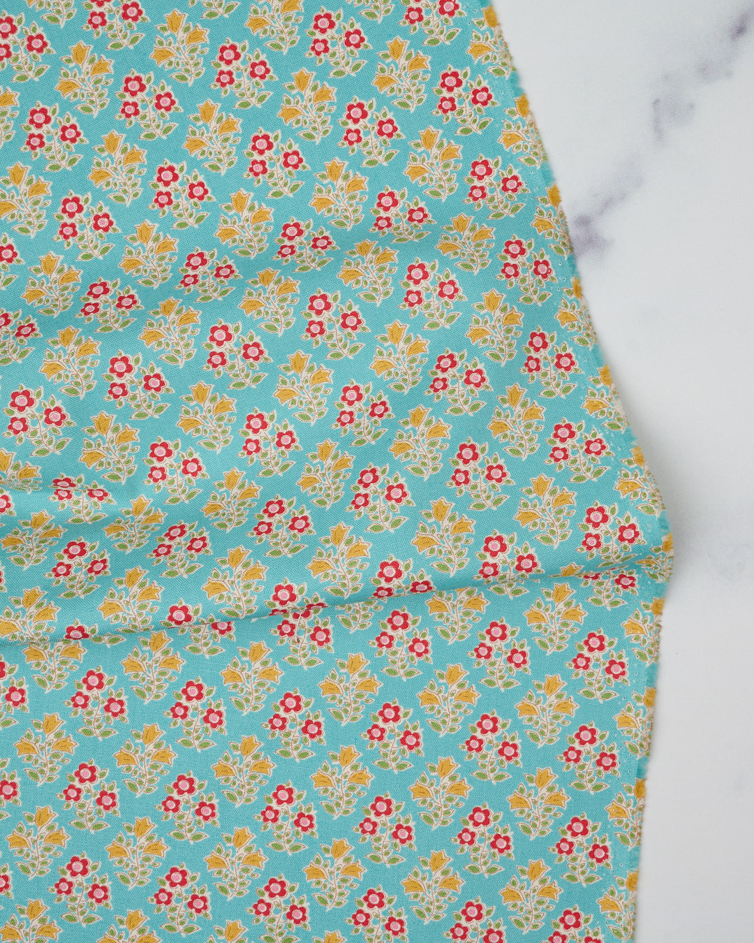 Cotton quilting fabric pattern called 'Farm Flowers in Teal'. Part of the 'Jubilee' fabric collection. Designed by Tilda Fabrics for fabric company Tilda Fabrics. SKU: 110103. 44-45 inch width.