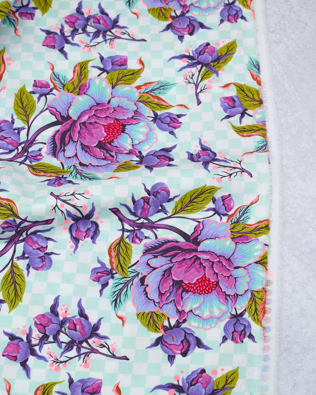 Cotton quilting fabric pattern called 'Peony for Your Thoughts in Nova'. Part of the 'Untamed' fabric collection. Designed by Tula Pink for fabric company Free Spirit Fabrics. SKU: PWTP235.NOVA. 44-45 inch width.