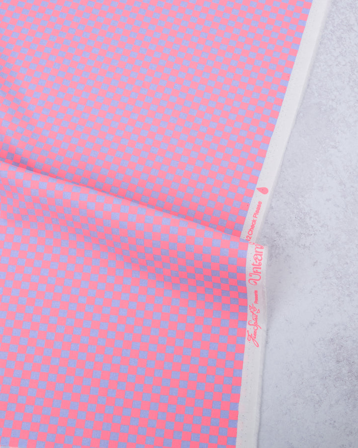 Cotton quilting fabric pattern called 'Check Please in Nova'. Part of the 'Untamed' fabric collection. Designed by Tula Pink for fabric company Free Spirit Fabrics. SKU: PWTP242.NOVA. 44-45 inch width.