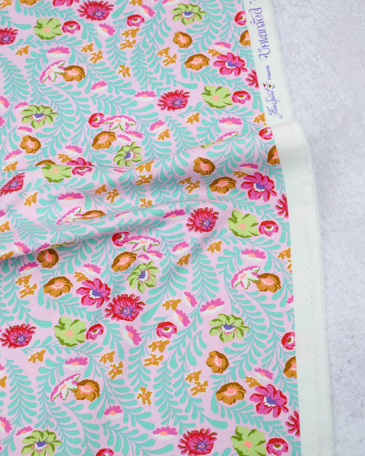 Cotton quilting fabric pattern called 'Flowerfield in Lunar'. Part of the 'Untamed' fabric collection. Designed by Tula Pink for fabric company Free Spirit Fabrics. SKU: PWTP243.LUNAR. 44-45 inch width.