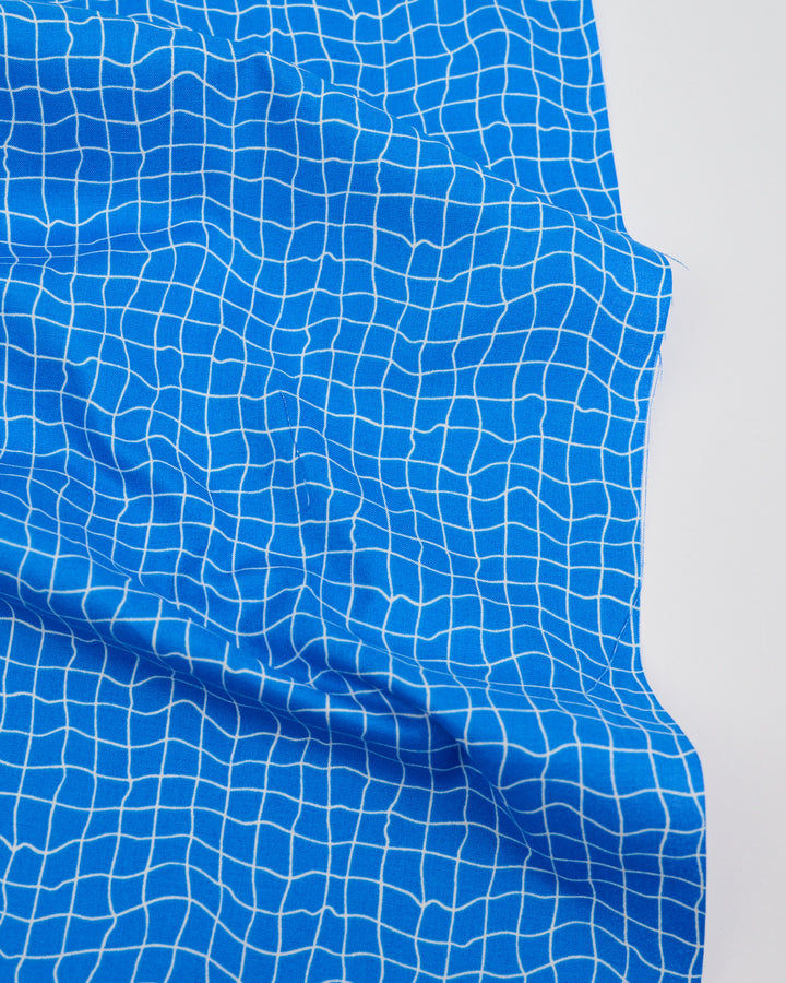 Cotton quilting fabric pattern called 'Water Pool Tiles in Royal Blue'. Part of the 'Water' fabric collection. Designed by Ruby Star Society for fabric company Moda Fabrics. SKU: RS5131 16. 44-45 inch width.