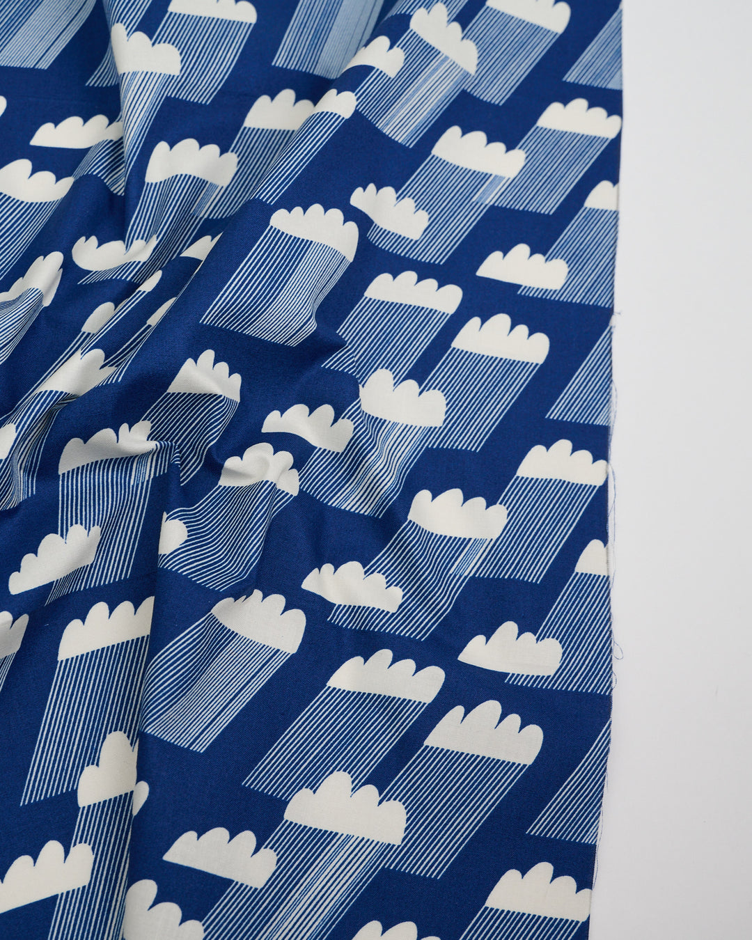 Cotton quilting fabric pattern called 'Water Rainclouds in Navy'. Part of the 'Water' fabric collection. Designed by Ruby Star Society for fabric company Moda Fabrics. SKU: RS5126 13. 44-45 inch width.