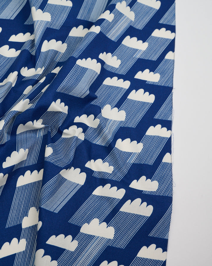 Cotton quilting fabric pattern called 'Water Rainclouds in Navy'. Part of the 'Water' fabric collection. Designed by Ruby Star Society for fabric company Moda Fabrics. SKU: RS5126 13. 44-45 inch width.