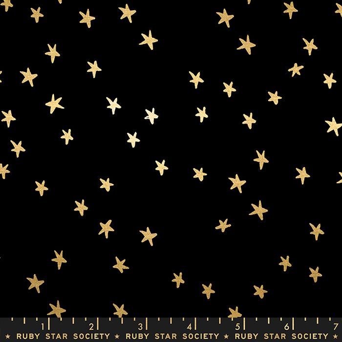 Cotton quilting fabric pattern called 'Starry in Black Gold'. Part of the 'Starry' fabric collection. Designed by Ruby Star Society for fabric company Moda Fabrics. SKU: RS4109 50M. 44-45 inch width.