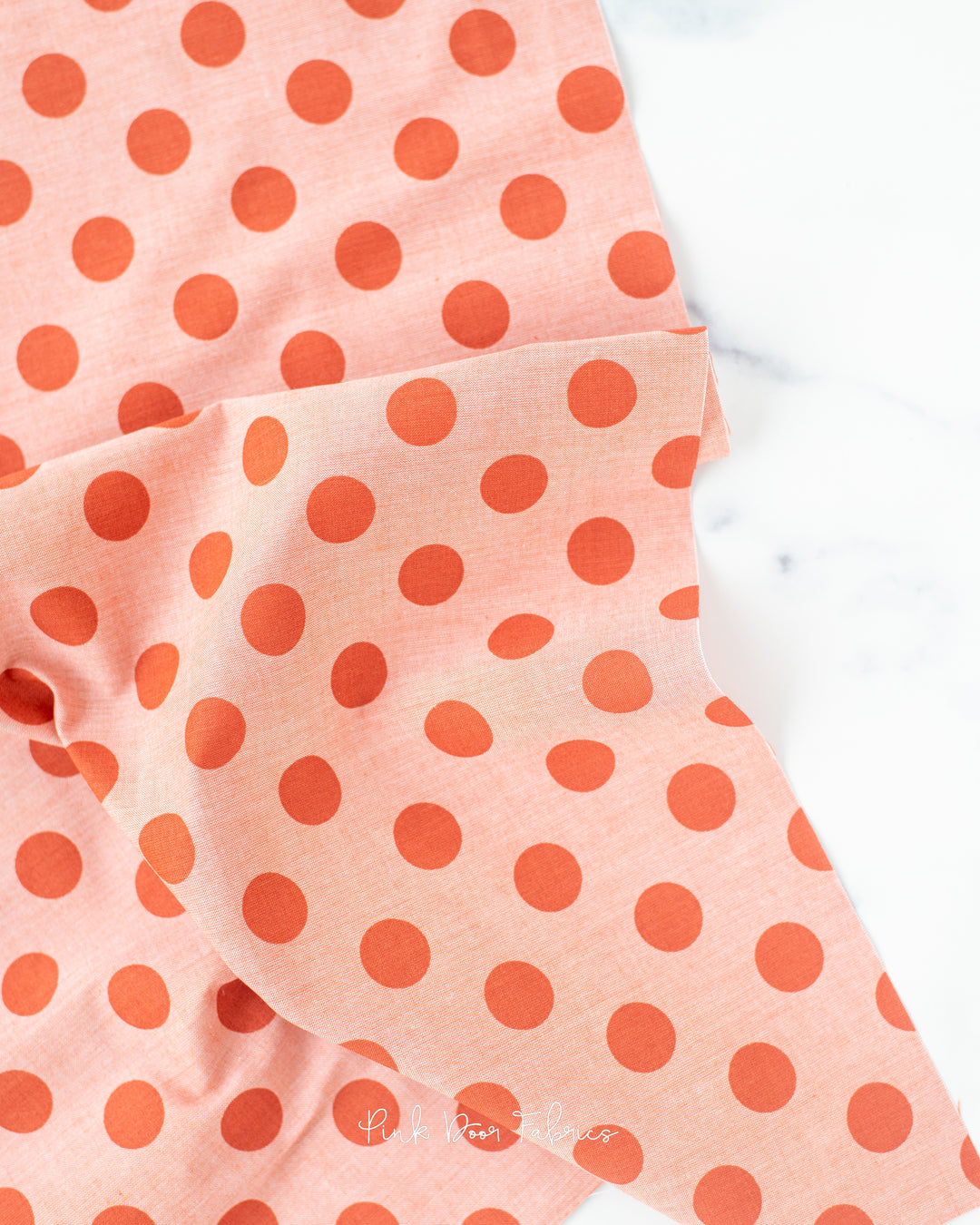 Chambray quilting fabric pattern called 'Ginger'. Part of the 'Chambray Dots' fabric collection. Designed by Tilda Fabrics for the Tilda Fabrics fabric company. SKU: 160052. 44-45 inch width.