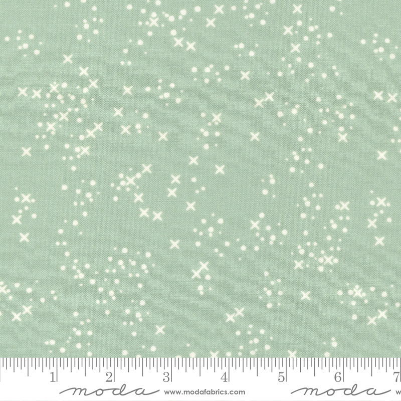 Cotton quilting fabric pattern called 'Stitch Confetti in Dusty Mint'. Part of the 'Dawn on the Prairie' fabric collection. Designed by Fancy That Design House for fabric company Moda Fabrics. SKU: 45577 18. 44-45 inch width.